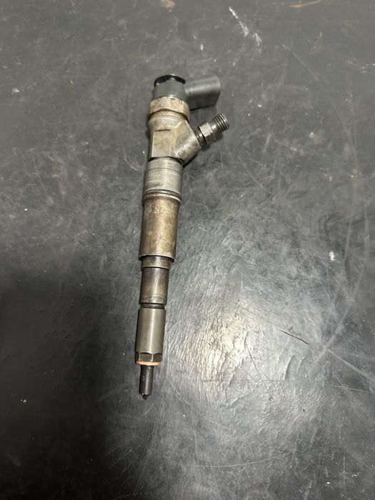 Injector BMW Seria 5 E60 525d 2.5 diesel 177cp 7794652