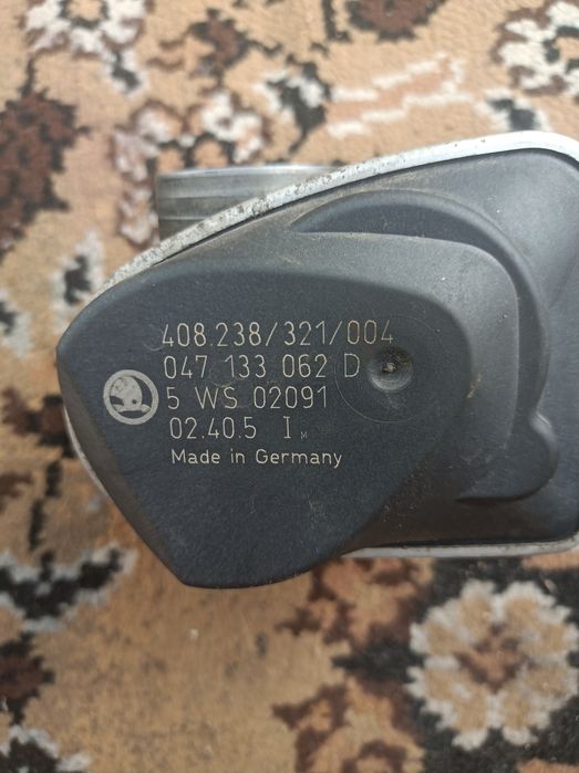 Дроссельная заслонка