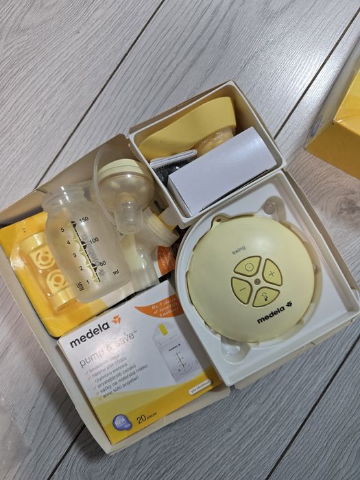 MEDELA Молокоотсос SWING электрический