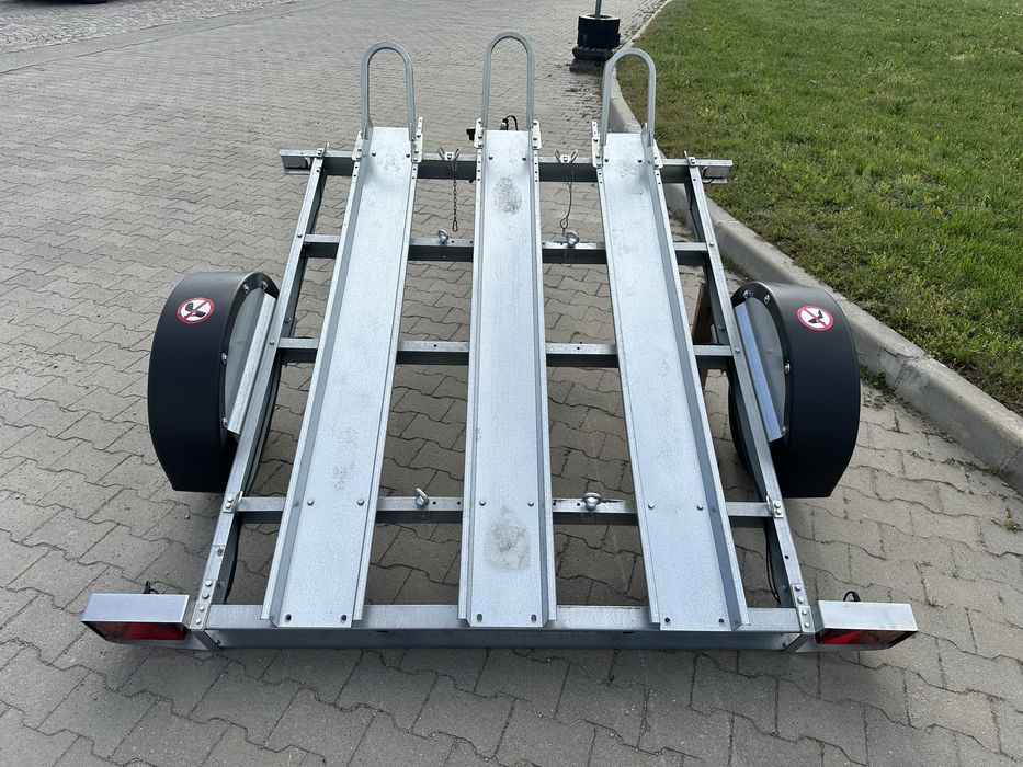 Ремаркета / платформи / колесари за превоз на мотори и АТВ под наем