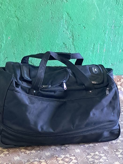 Сумка на колесиках