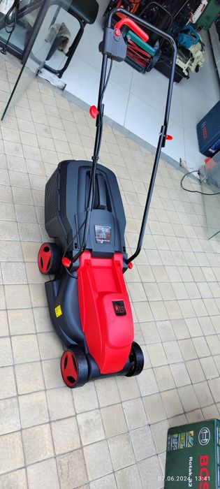 Электрическая газонокосилка