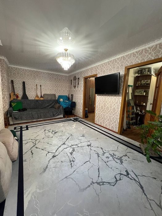Продам 4 комнатную квартиру