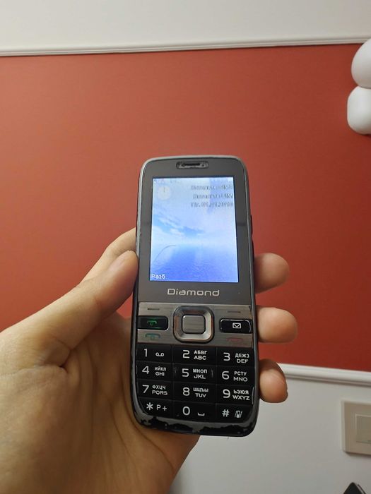 Телефон кнопочный