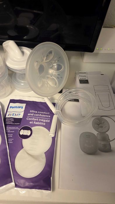 Vand pompa de san electrica nouă Philips Avent + cadou tampoane  pentru san .