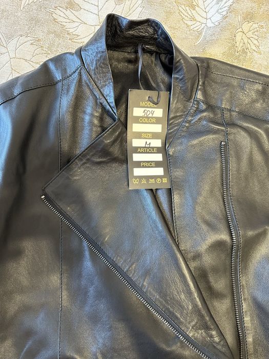 Кожаный длиный жилет