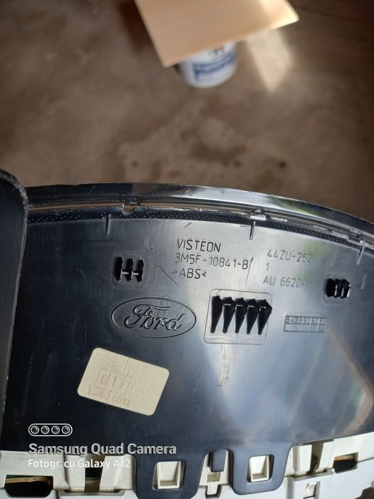 Faruri,stopuri,casetofon,ceas bord si grila ford focus 2