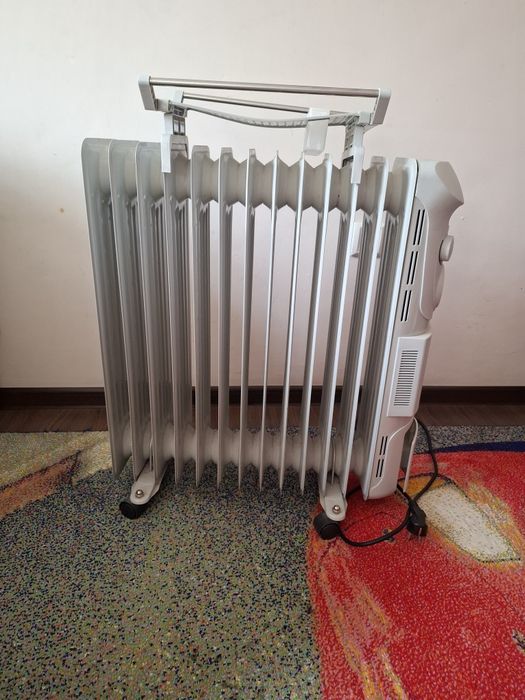 Elektr isitgich Artel rusumda