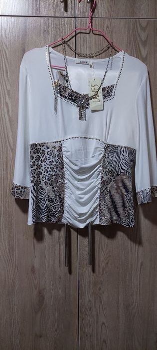 Yengi dvoyka qora rangi 550mingdan oq kostyumchik 350mingdan