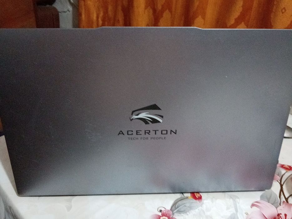 НоутбукАсеRTON555