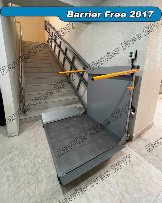 Наклонный подъемник для инвалидов по лестнице