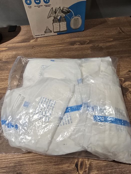 Молокоотсос Mom Help BP210 в идеале с вкладышами