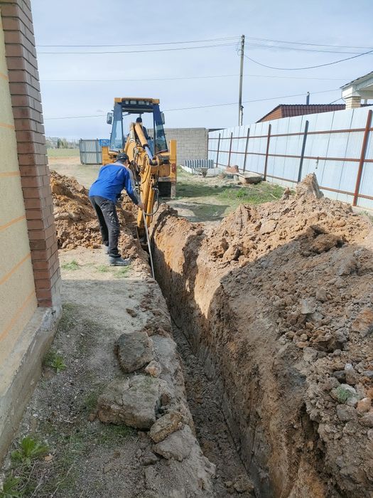 услуги Экскаватора погрузчика