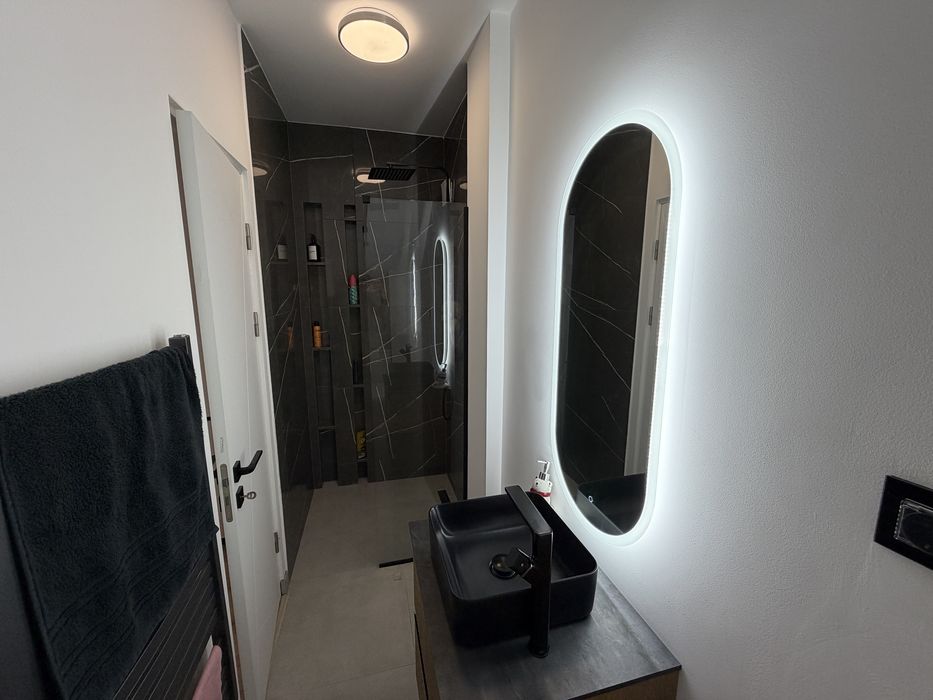 Apartament 3  camere cu etaj ,curte 40mp,parcare subteran cu incarcare