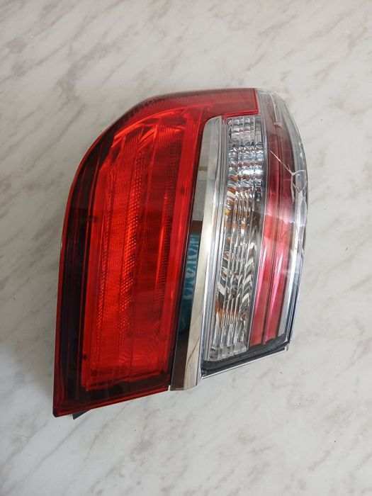 Фонарь задний камри 55