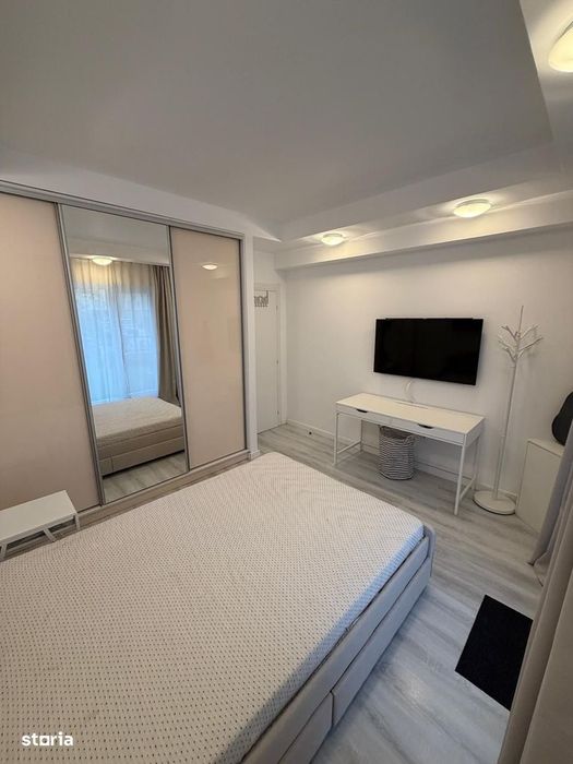 COSMOPOLIS - Apartament cu 3 camere si gradina, mobilat si utilat.