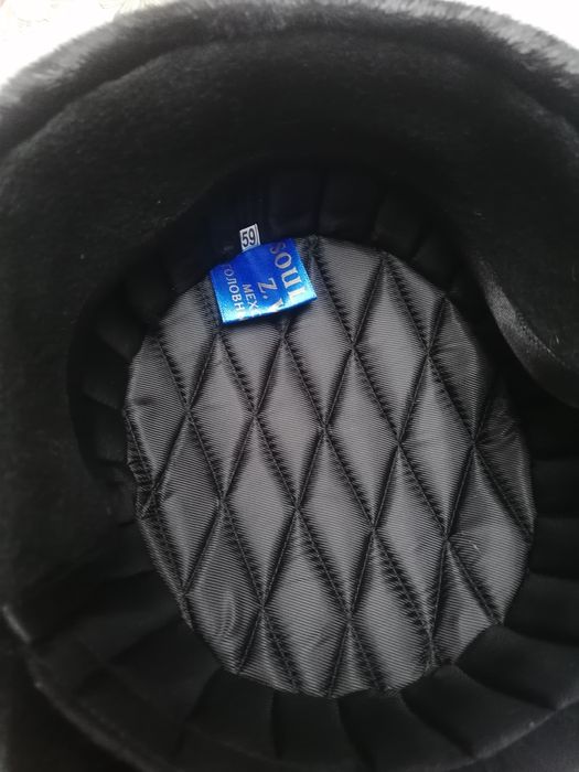 Căciulă Bărbați eleganta, blana de nutrie, noua, marimea 59.
Preț de m