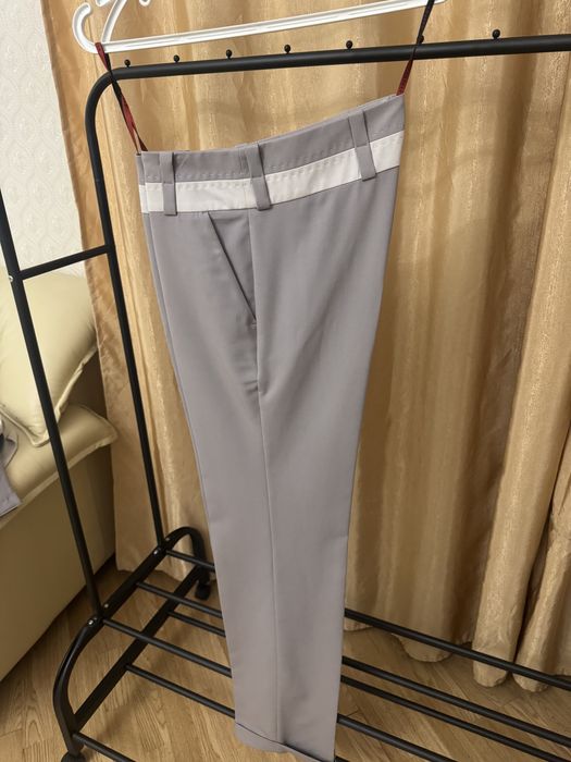 Брючные костюмы новые