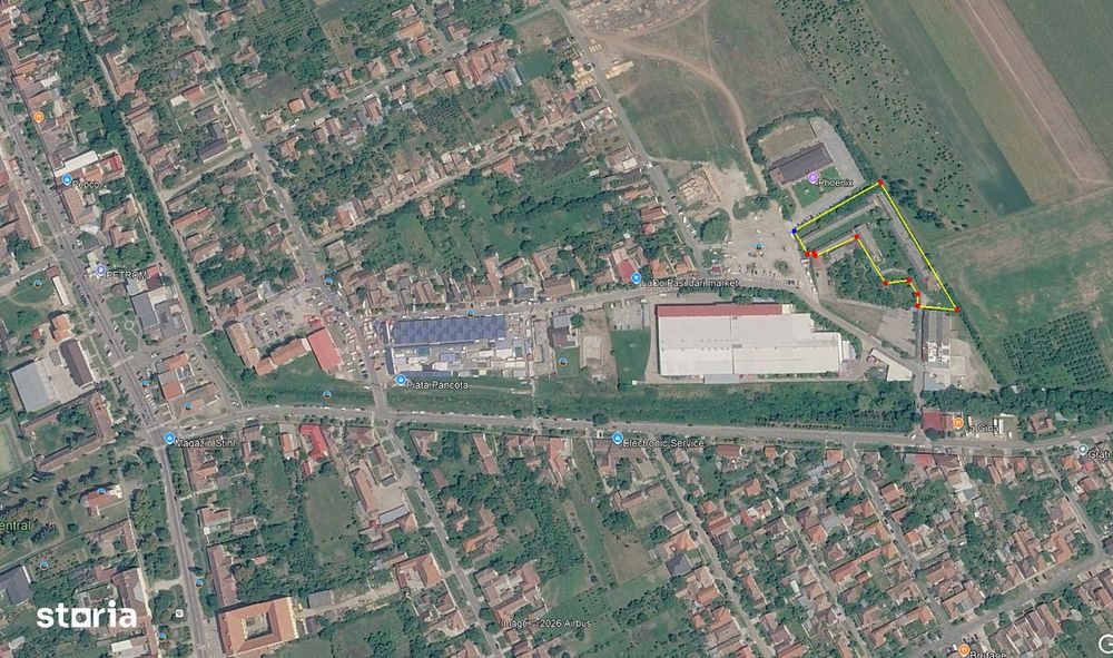 Teren intravilan de vânzare în Pâncota – 3.175 mp cu hale + 2.983 mp