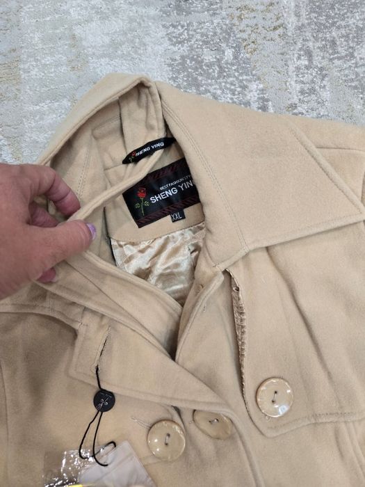 Продам пальто новое