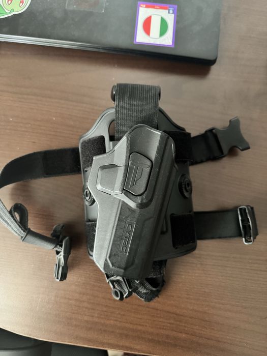 Toc pistol cu platforma pentru picior