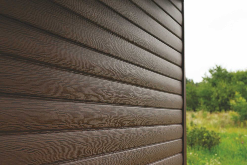 Сайдинг под дерево Дуб. Карнизы, софиты, кирпич, водосток