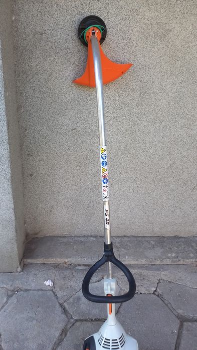 Тример Husqvarna щил