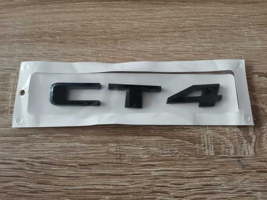 черно лого Cadillac CT4