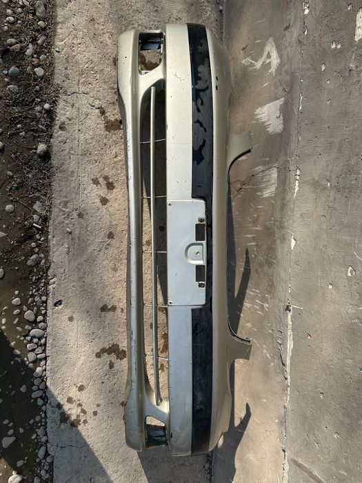 Toyota Corolla E120 Бампер передняя