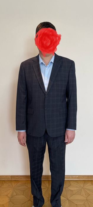 Продам новый костюм