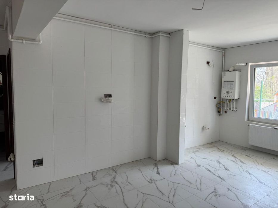 Aparatment 52 mp + Curte Proprie 55mp + Loc de parcare Subteran