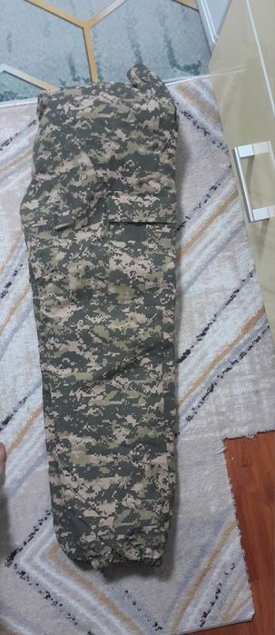 Бушлат, ватник , китель, брюки, ушанка , кепка.