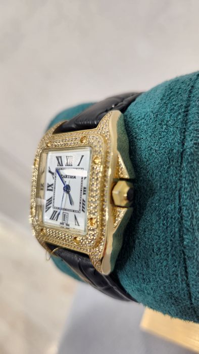 Золотые женские часы Cartier