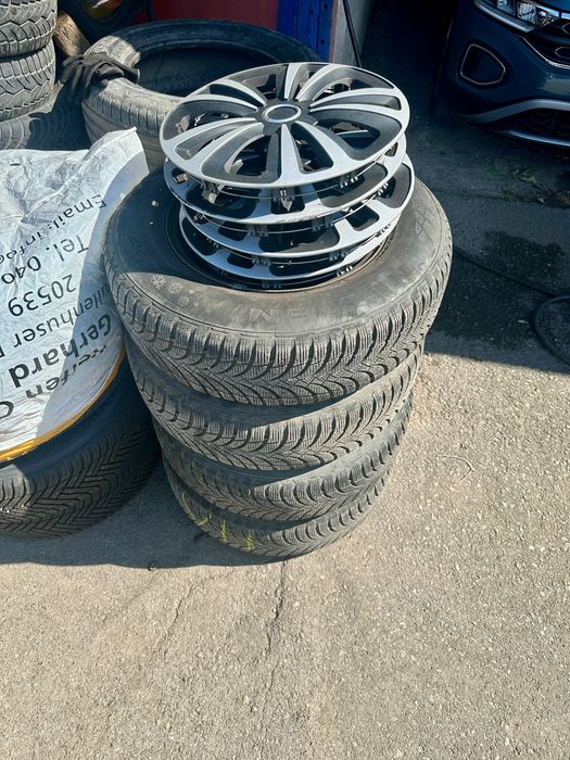 Комплект 4 бр. зимни гуми Nexen 215/70 R16 със стоманени джанти и тасове