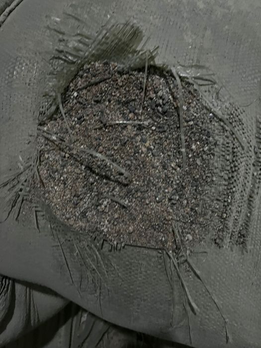 Песок в мешках,капталған құм