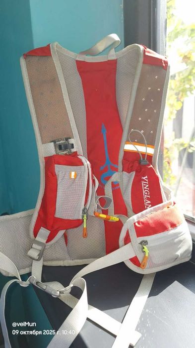 Продам новый велорюкзак красного цвета