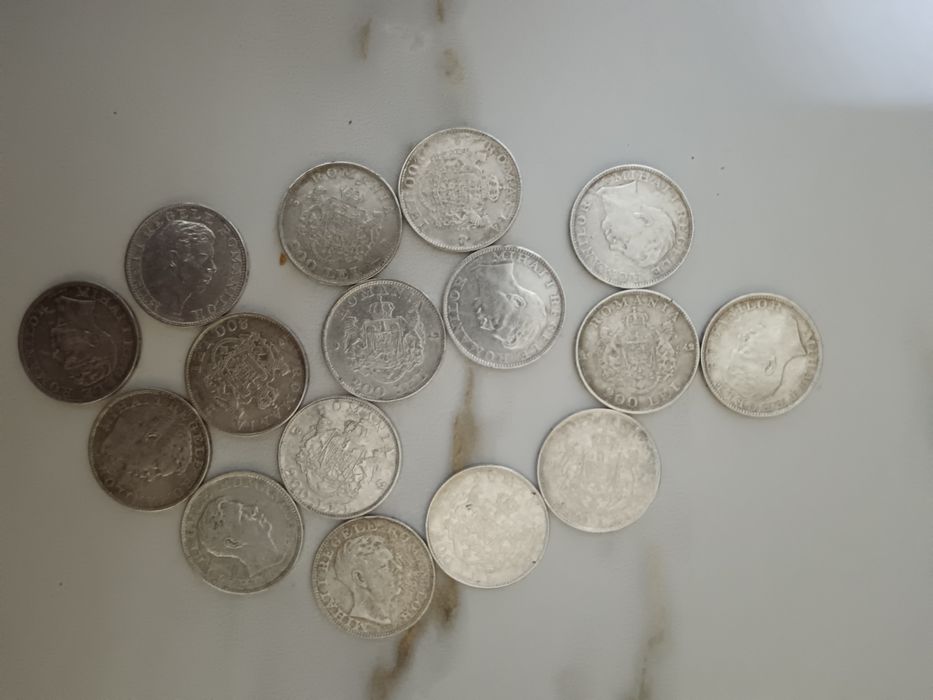 19 monede de argint. 1400 lei