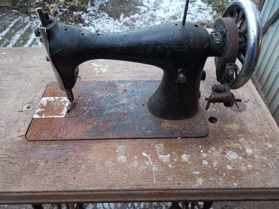 Mașină de cusut Singer