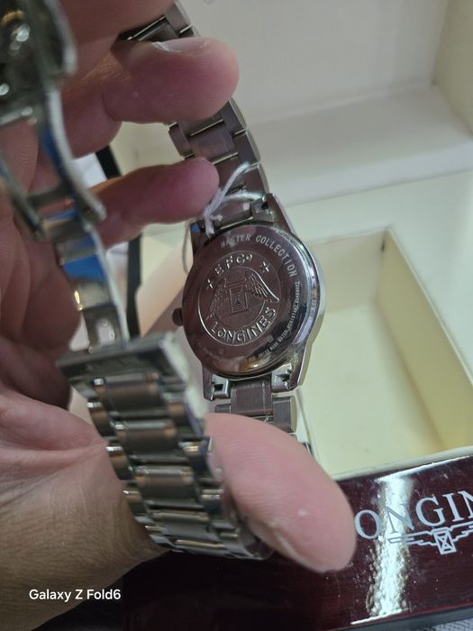 Longines quartz нов