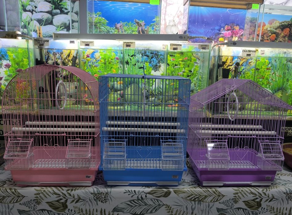 Клеточки для попугаев