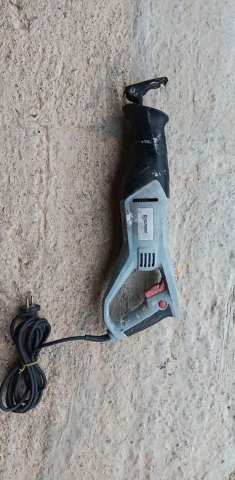 Тротинетка и саблен трион