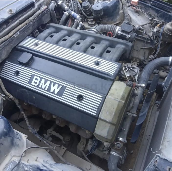 Двигатель M50b20
