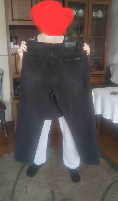 Джинсы Tapered fit
