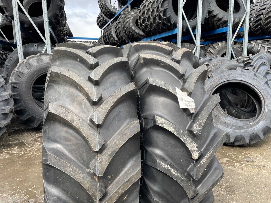 Cauciucuri noi 16.9-24 cu 10 pliuri pentru tractor fata marca OZKA