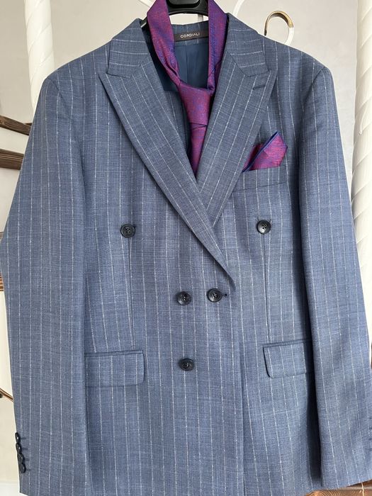 Костюмы 48 размер