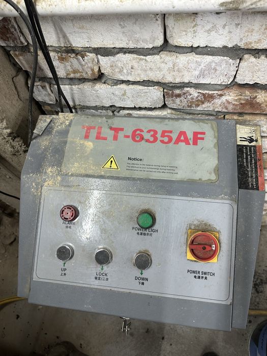 Автоподьемник ножничного типа