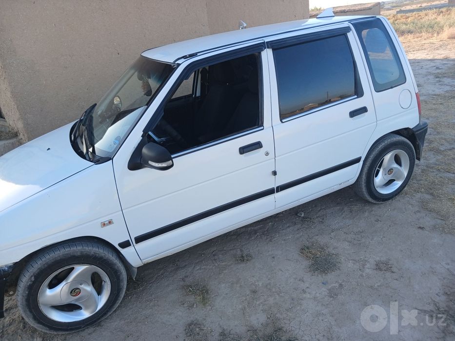 Tiko 2001 rangi oq