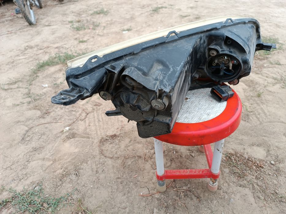 Фара левая на Мицубиси Кольт