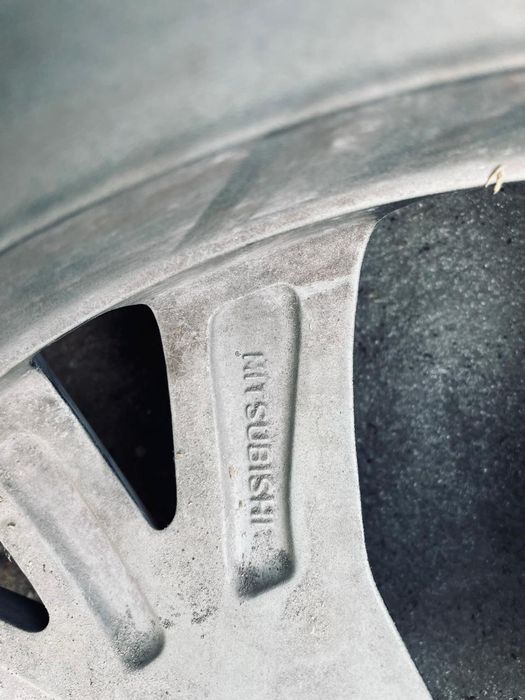 митцубици аутлендер диск с шиной оригинал!