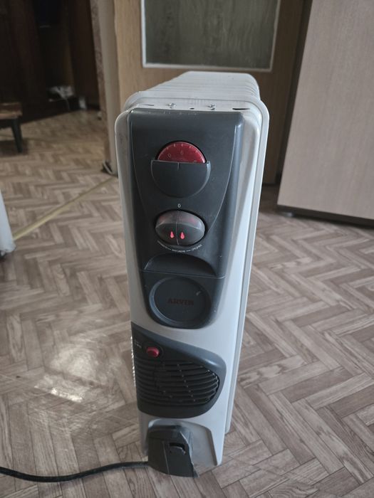 Маслянный обогреватель